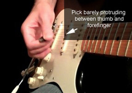 How to hold the pick to play Pinch Harmonics